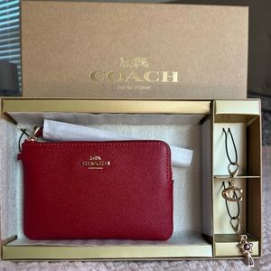 Coach boxed leather wristlet with two keychains in red ❤️